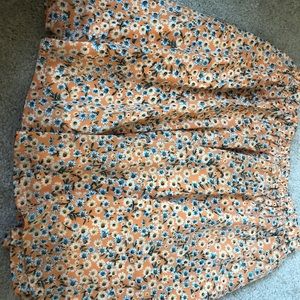 orange flowy skirt